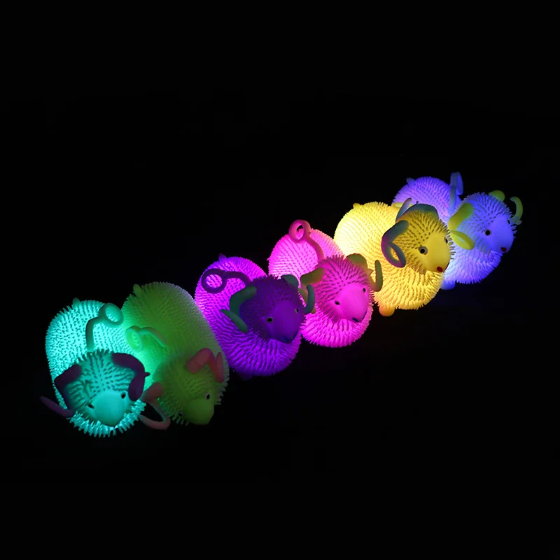 HEBEIER Wholesale LED electronic cartoon flashing animal TPR soft spiky squeeze expandable ball toys for kids