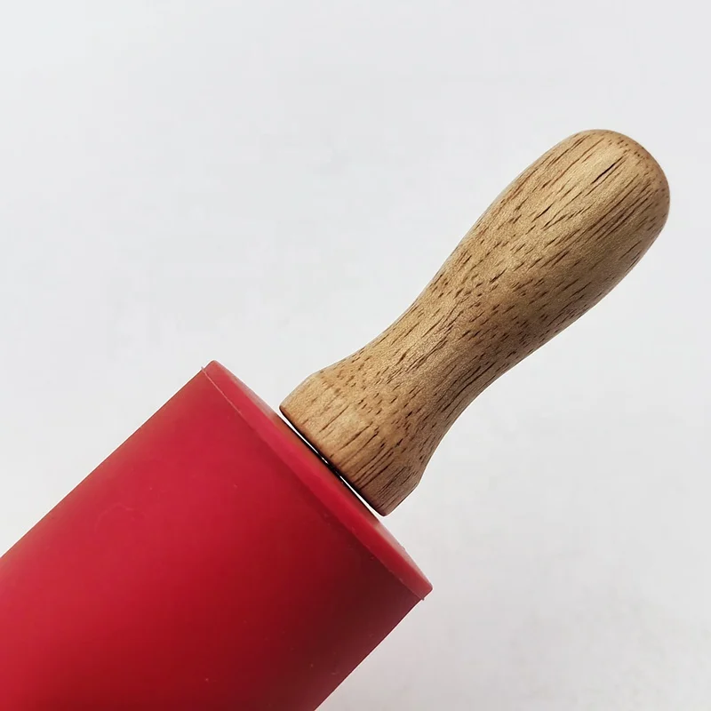 Wholesale Mini Silicone Embossing Rolling Pin For Noodle And Fondant Silicone Rolling Pin With Wooden Handle