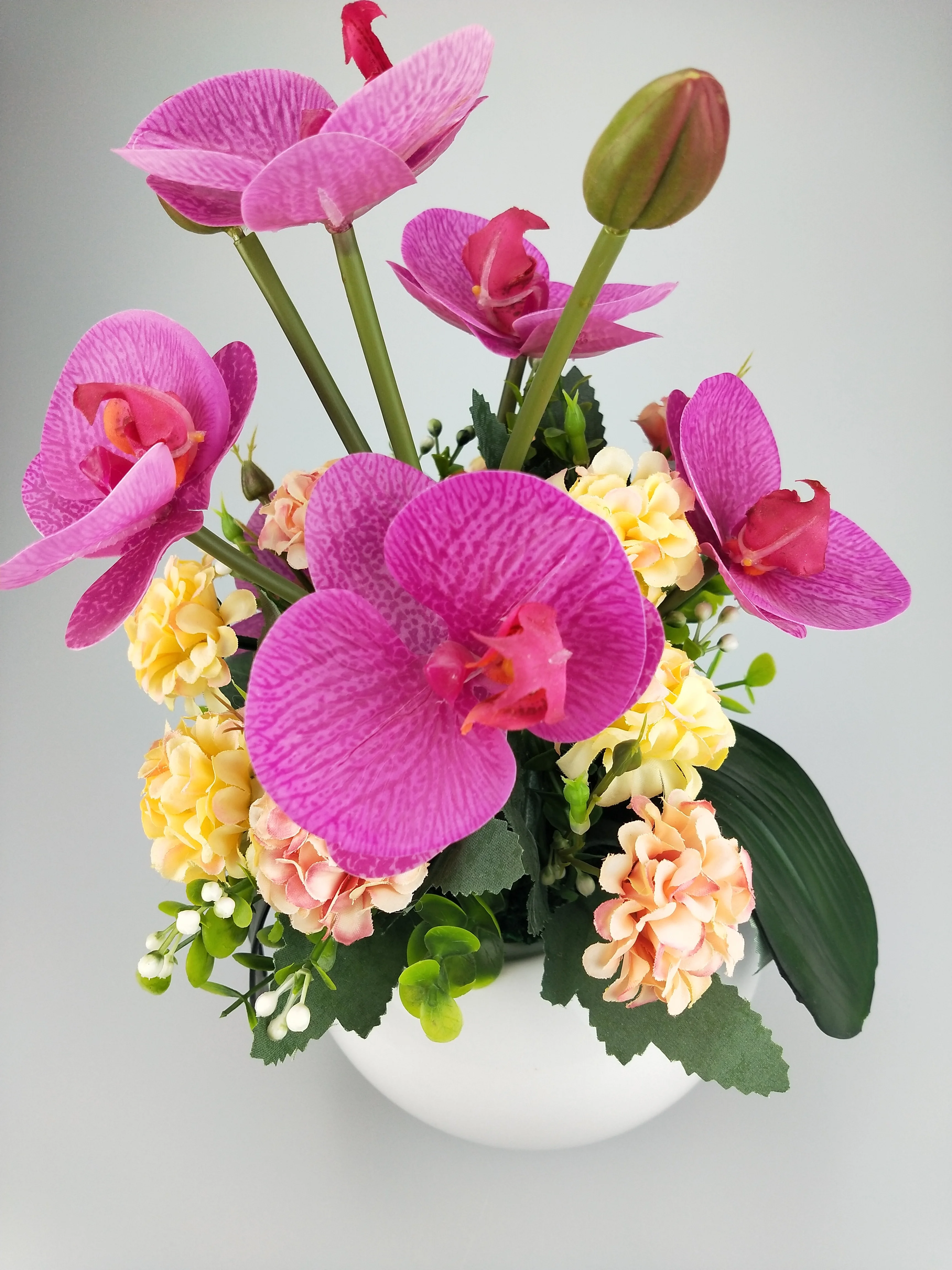 Chinese factory supplier cheap price artificial plastic flower arrangement orchid PE foam leaves in ceramic pot home decor