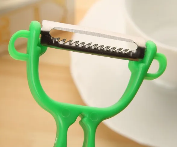 Multi function double head vegetable peeler grater