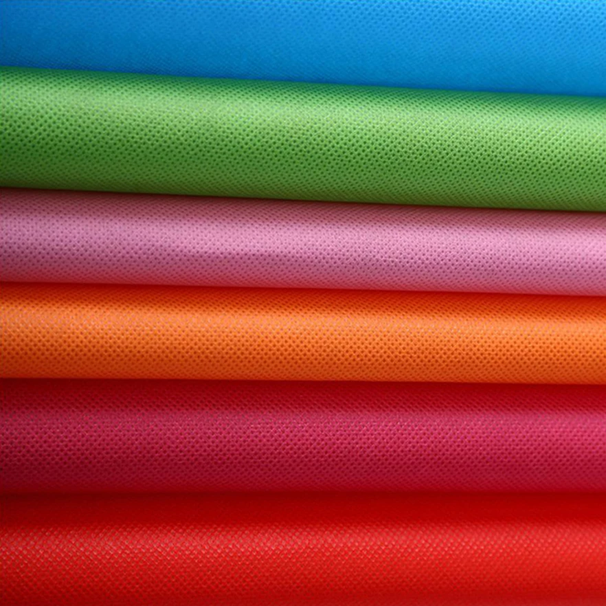 Factory promotion price hot sale colorful 100% polypropylene biodegradable nonwoven fabric manufacturers