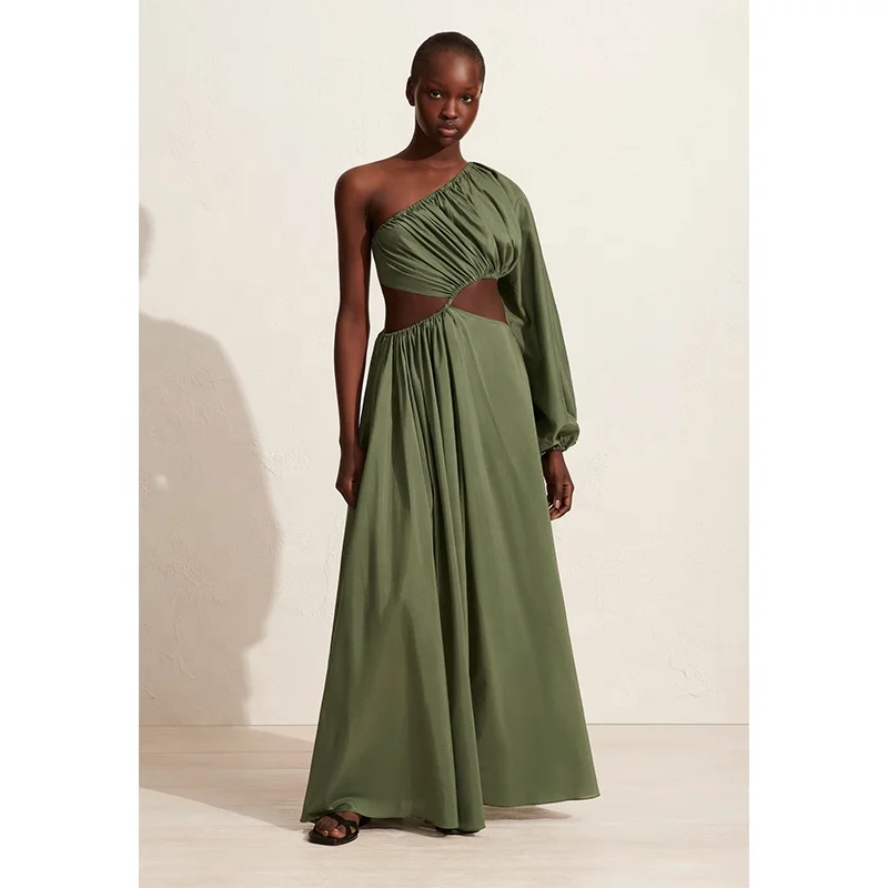 Women asymmetric full-length dress with bold waist cut-outs and a single voluminous long sleeve organic cotton maxi dress