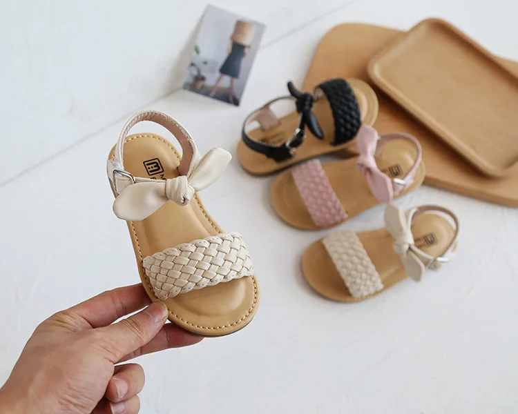 Western style girls woven sandals summer sweet bow board shoes soft bottom beach artificial leather sandals