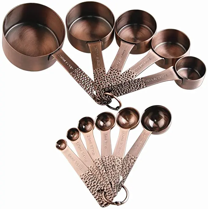  Set of 11 copper-plated stainless steel measuring cups and spoons 5 6 colored