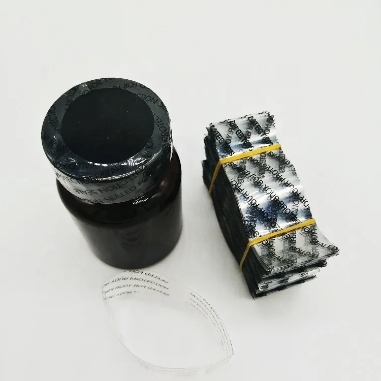 PVC Shrink Bands Printed Black Sealed For Your Protection with Perforation Single Vertical Perf  for safety seals