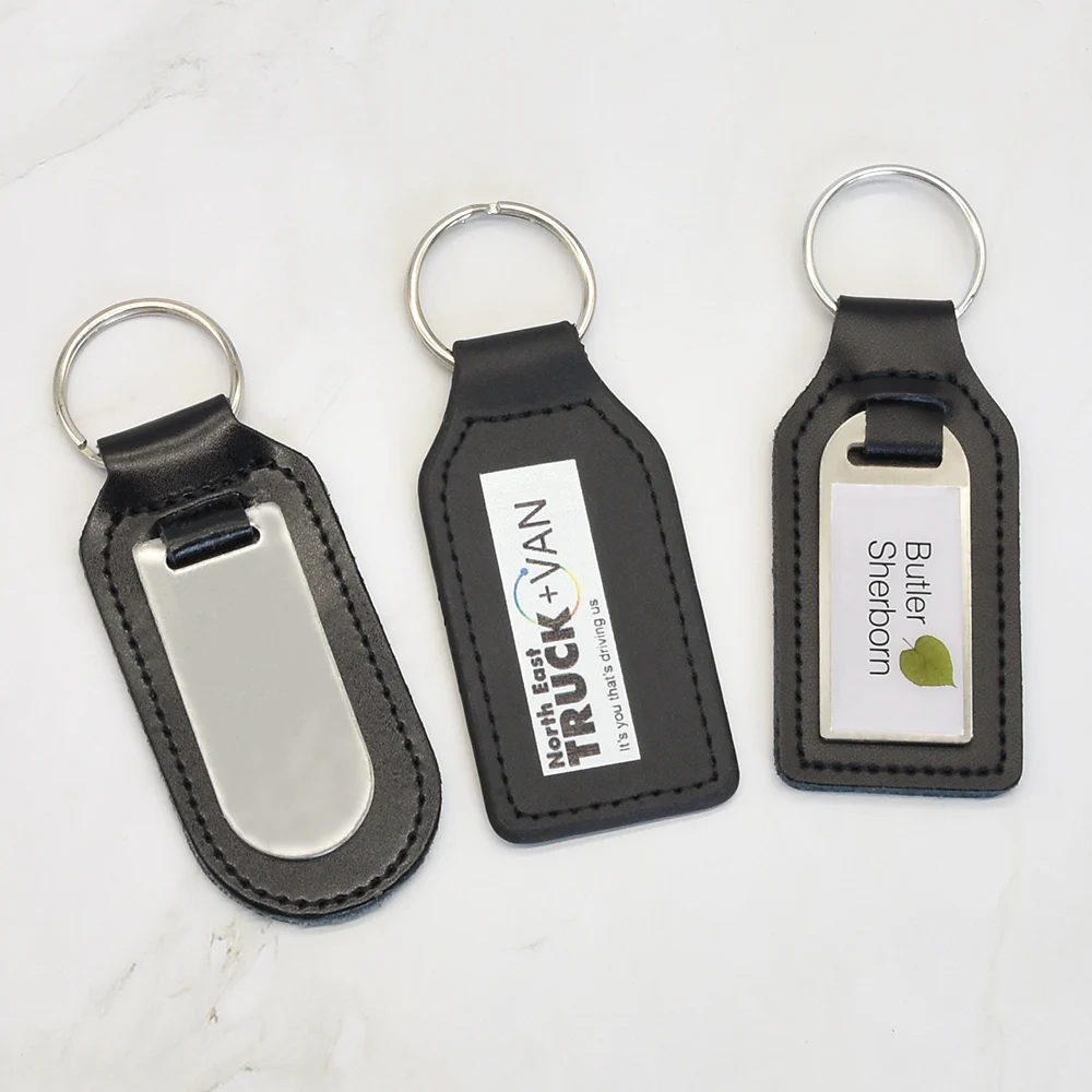 Custom embossed logo laser engraving car keychain keyring pu leather keychain metal leather keychain