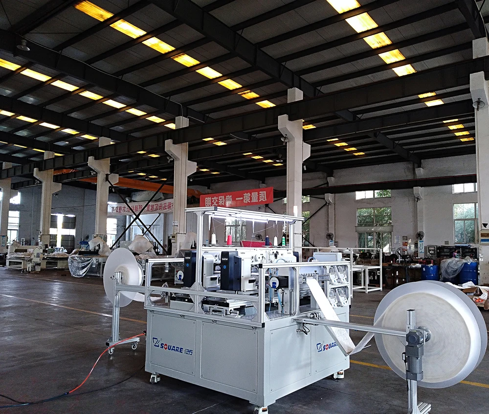 Машина для прошивки краев матраса с четырьмя головками