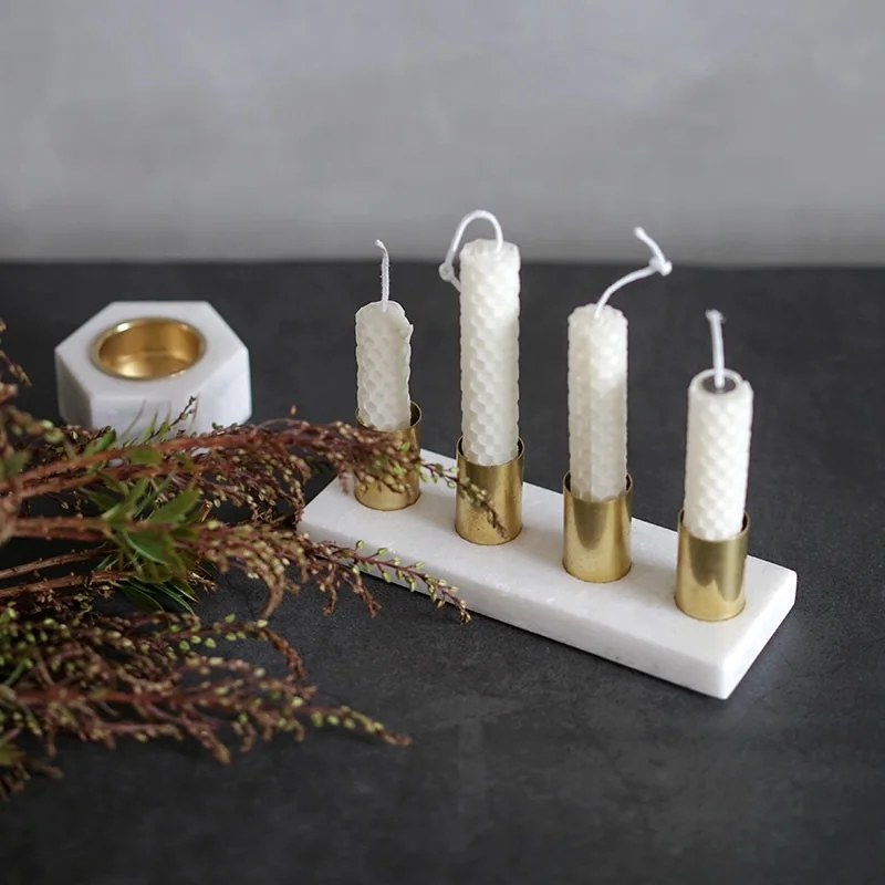 
White practical polished marble 4 arm candle holder sets with brass accents 