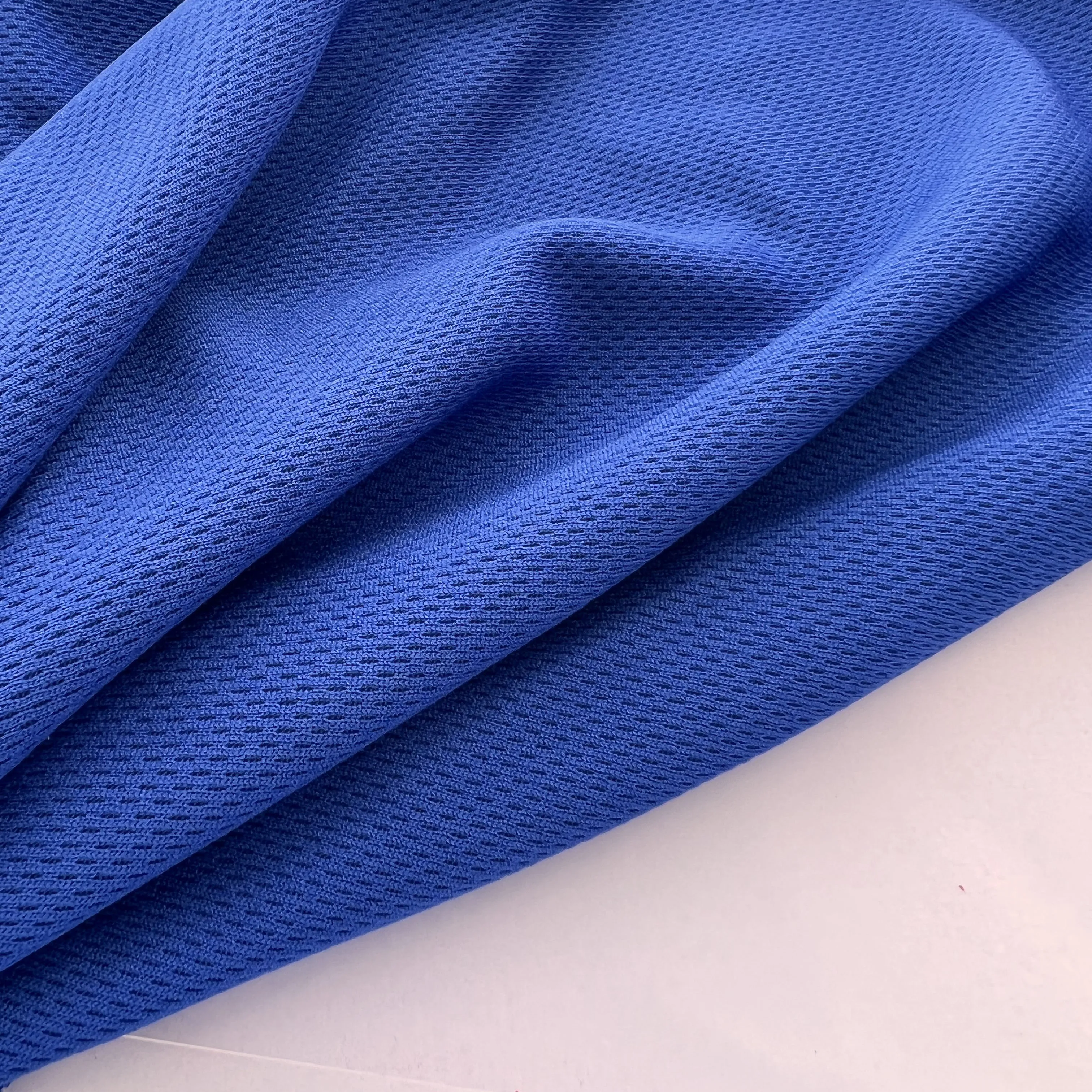Wholesale High Quality Navy Blue 100% Polyester Mesh Bird Eye Fabric Fluorescent