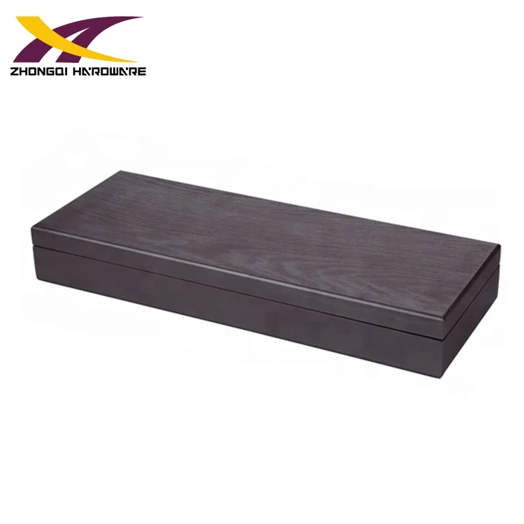 Varnished brown wooden case with stainless steel champagne swords and champagne stopper