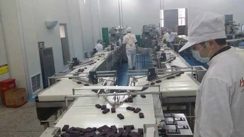 Chocolate bar Mars Kitkat production line