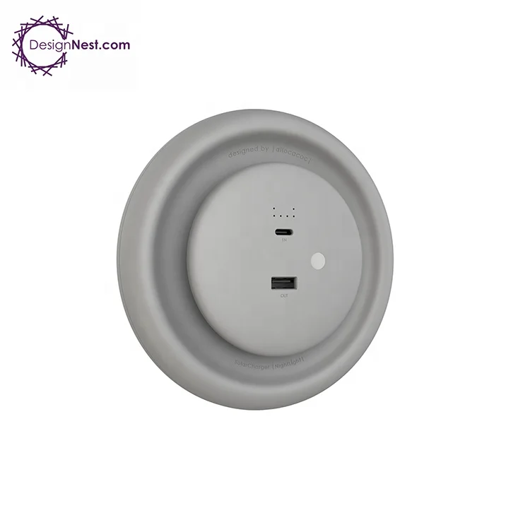 Solar Wall light Dimmable LED light USB-C input and USB-A output Charging phone by the LightDisc sticky pad