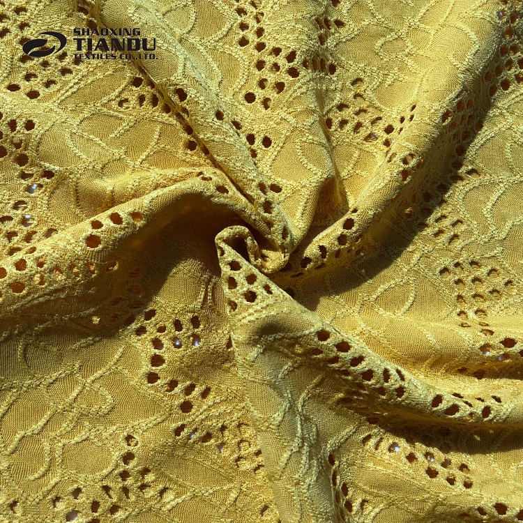 
Super soft Embroidered Solid DTY eyelet knitted jacquard 95% polyester 5% spandex stretch fabric 