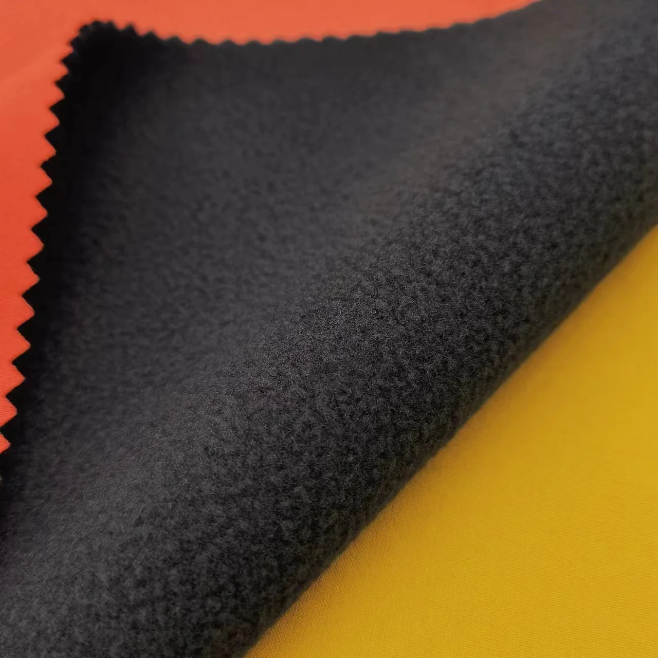 100% Polyester Softshell Plain Breathable Waterproof Windproof TPU Bonded Fleece 3 Layer Softshell Fabric For Jacket