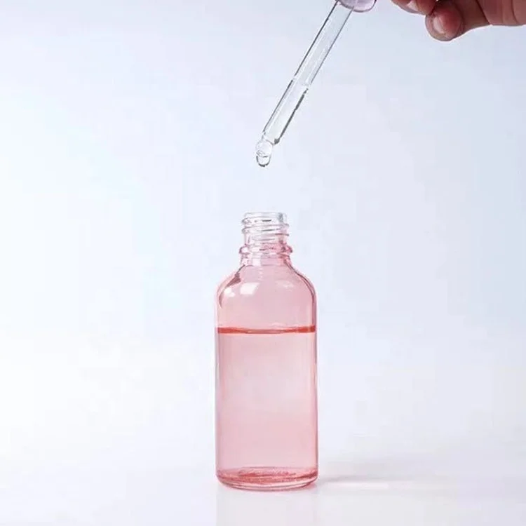 Alibaba hot selling custom size pink glass dropper bottle with delicate gift box
