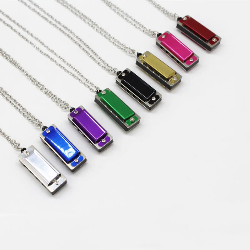 Wholesale custom logo hot selling stainless steel  4 hole 8 tone harmonica with opp  bag packing