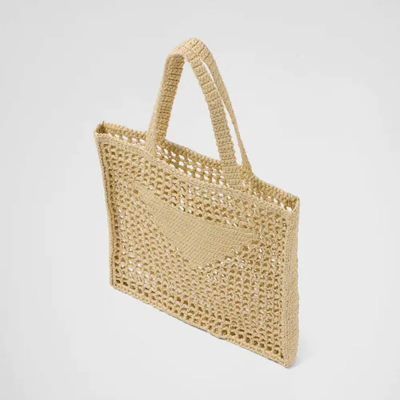 2023 brand mesh beach woven one-shoulder ladies handbag environmental protection paper rope grass hand woven bag