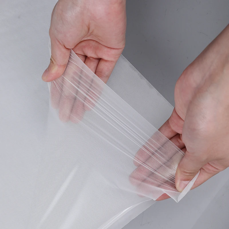 fabric bonding double side thermo heatnbond iron on adhesive Elastic tpu hot melt extra  stretch hot melt adhesive  film
