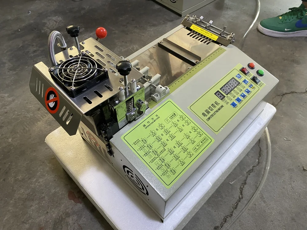 JK-110LR automatic electric webbing tape roll cutting machine leather belt ribbon conveyor strip rotary strap ribbon