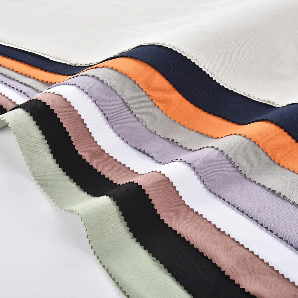 Oem Manufacturing Solid Color Antistatic T Shirt Fabric Stock Lot 65% Cotton 35% Polyester T-Shirt Fabric