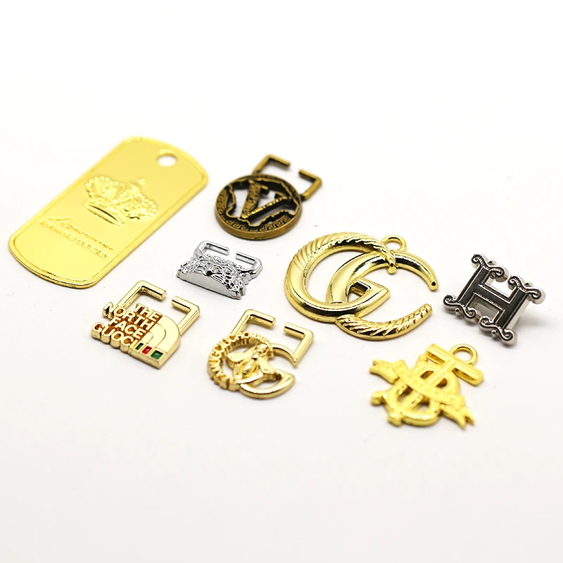 High Quality Rectangle Metal Casting Clothing Metal Label Tag Golden Engraved Logo Custom Metal Clothing Labels