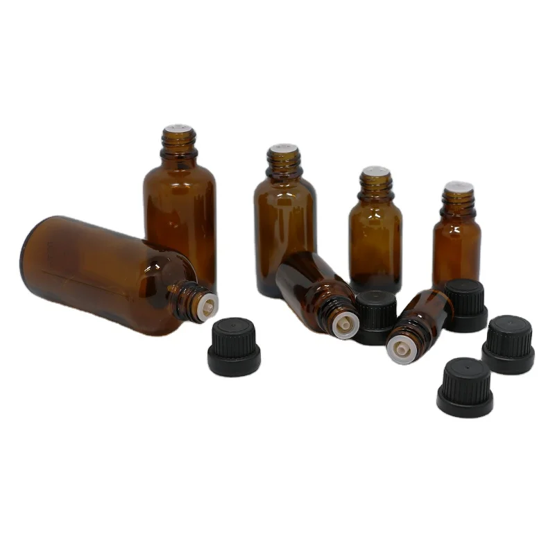 OEM Wholesale amber essential oil bottle 5ml 10ml 15ml 20ml 30ml 50ml 100ml DIN18 brown amber glass bottle with tamper proof cap