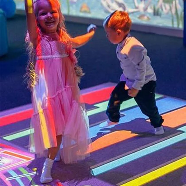 Chariot interactive floor games for children amusement park play.