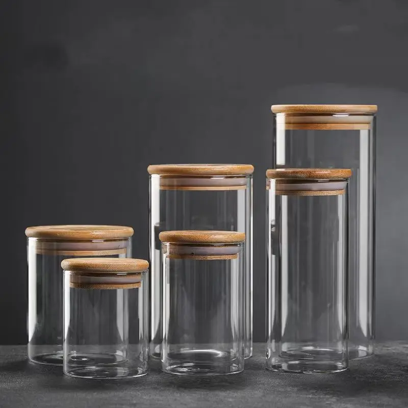 hot sell heat resistant high borosilicate kitchen containers cylinder glass sealed food cereal storage jar with bamboo lid