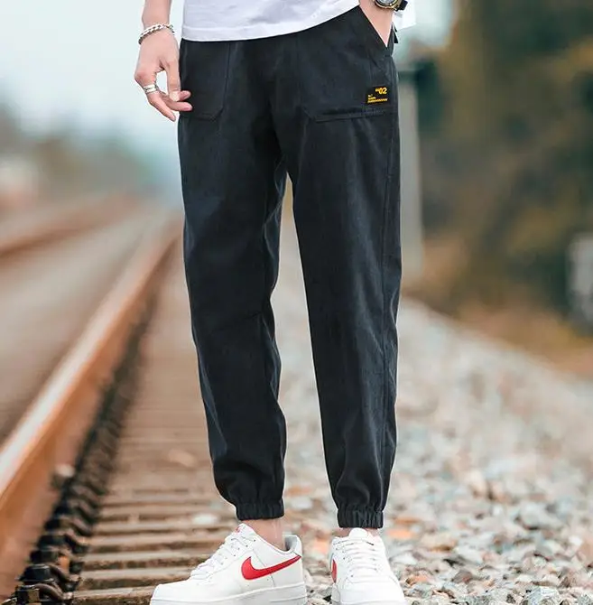 
2020 Autumn/winter plus fleecy pants for men loose-fitting sport long pants with thickening and large size corset overalls for m 