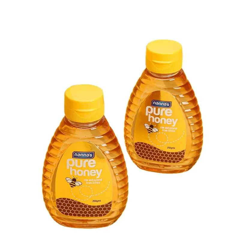 Factory direct sales PET Plastic honey jar with silicone lid squeeze honey bottle for bee juice