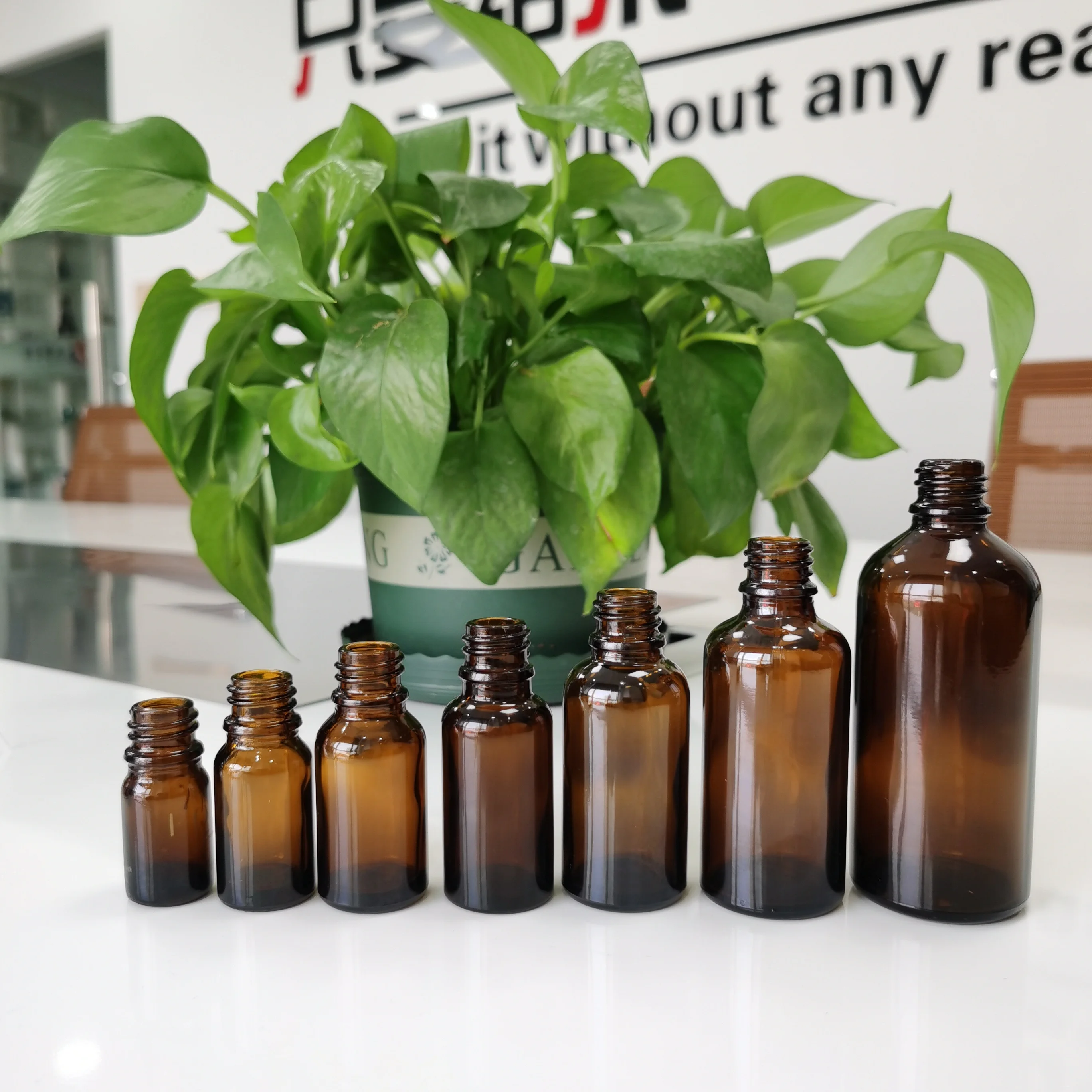 10ml brown euro glass bottle with children resistant cap with reducer for oil cosmetic packaging,amber glass spray bottle