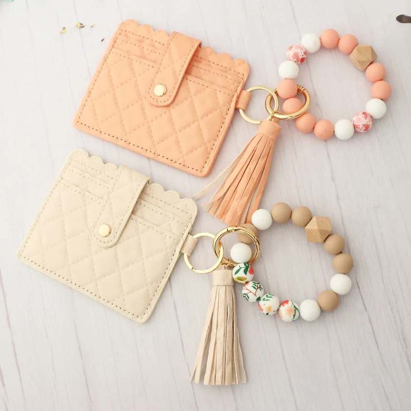 2022 In Stock Silicon Beads Bracelet Keychain Pu Leather Tassel Geometry Sewing Silicon Beads Wristlet Keychain Wallet for Women