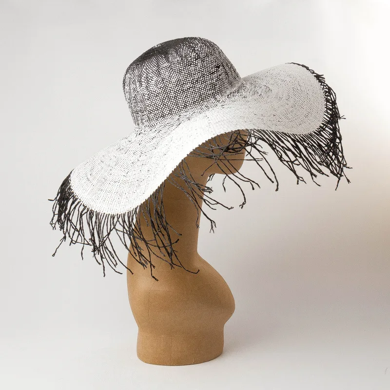 
European and American spring and summer new hairy dome paper straw hat fashion women large brimmed hat beach straw visor 
