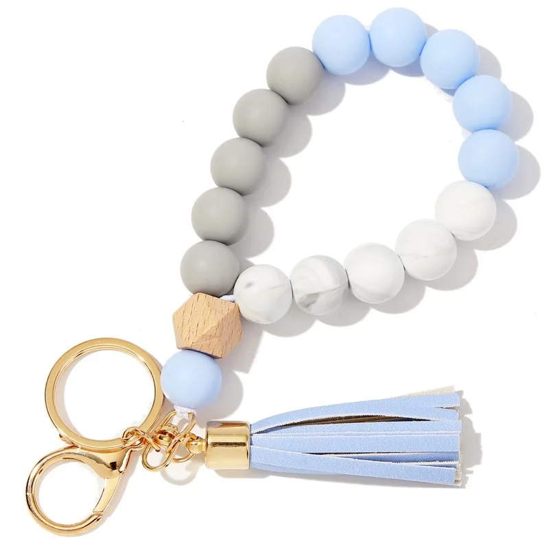 wholesale New Food Grade Silicone Wooden Beads Wristlet Bracelet Pu Tassel Design Anti Lost Car Key Chain Holder