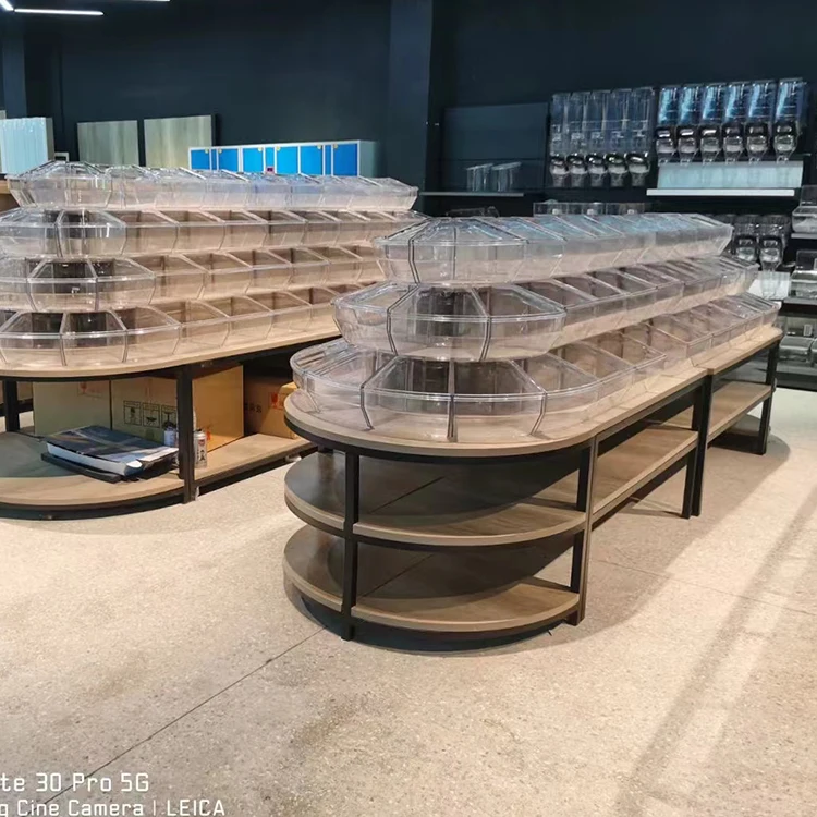 Customized supermarket dried fruit display stand gondola shelf snack island display candy display stand