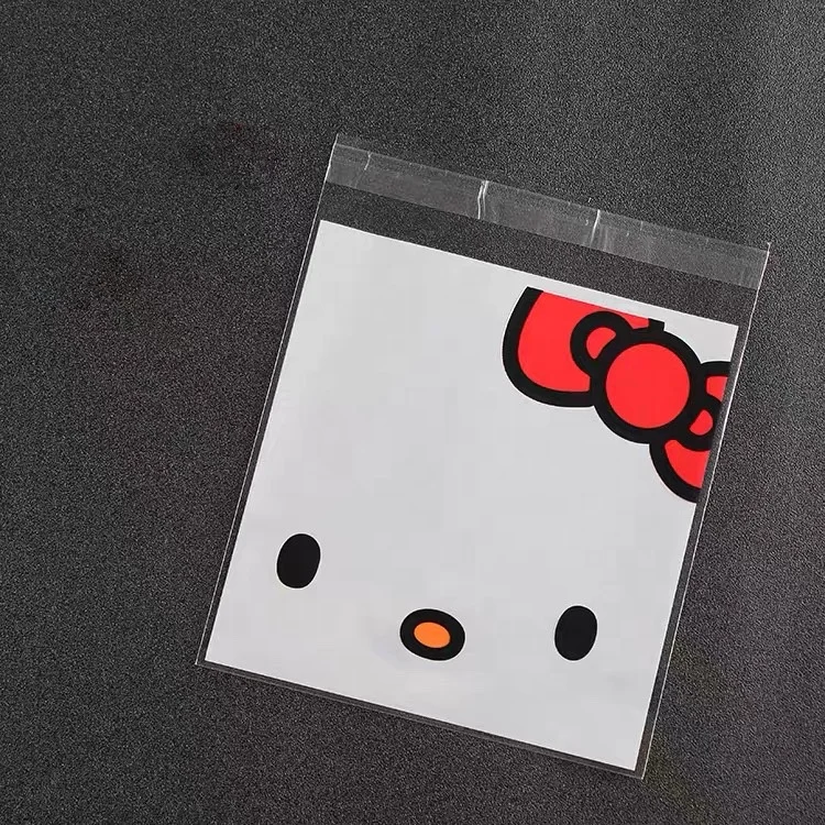 Factory wholesale mini DIY snack packaging self adhesive biscuit bags cellophane with cartoon
