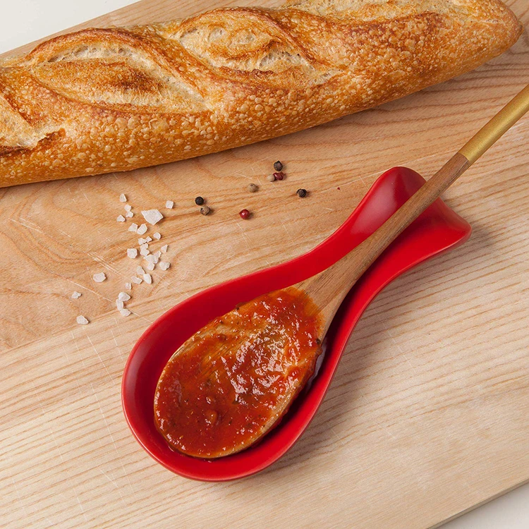Decorative kitchenware red color ceramic spoon rest with simple design