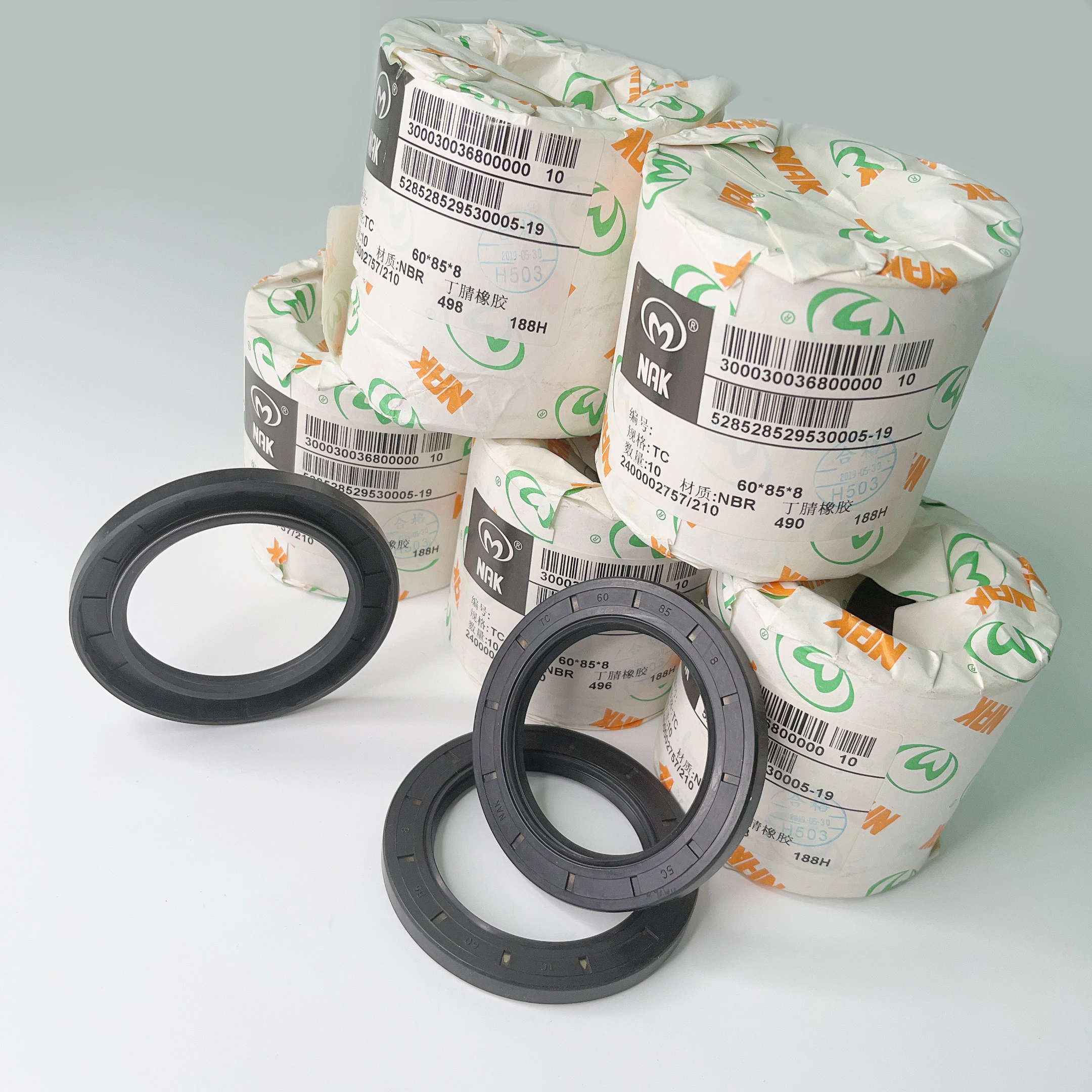 CAIMI qualified manufacturer pos gearbox FKM+spring rotary shaft oil seal NAK