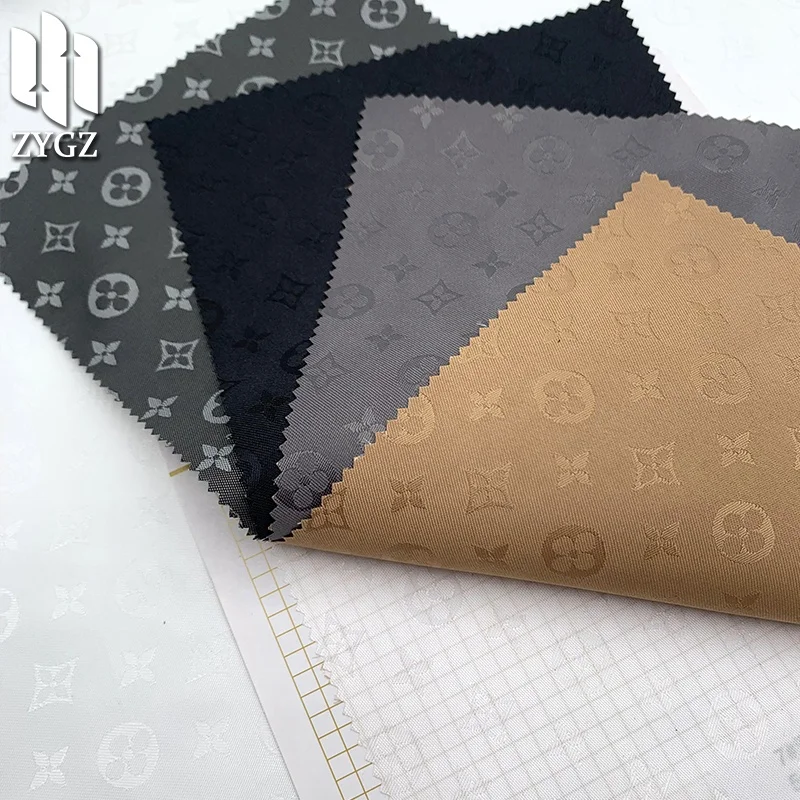 100 polyester 90GSM fashion brand jacquard yarn-dyed satin fabric clothing fabric lining wholesale