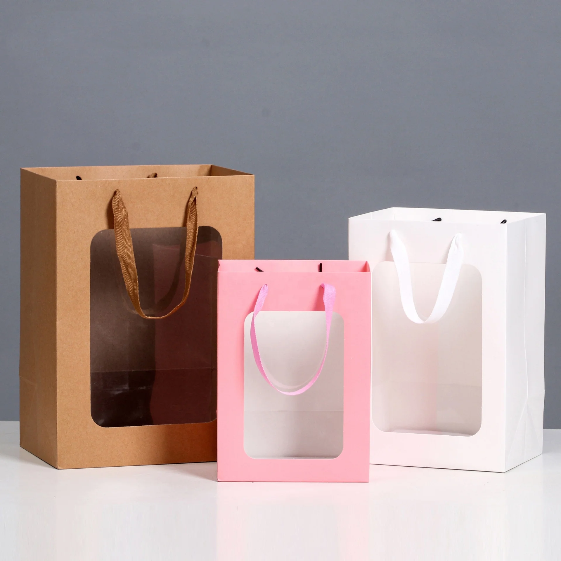 Customized Logo Design Luxury Paper Bag Gift Packaging Bag Shopping Paper Bag With Ribbon Handle
