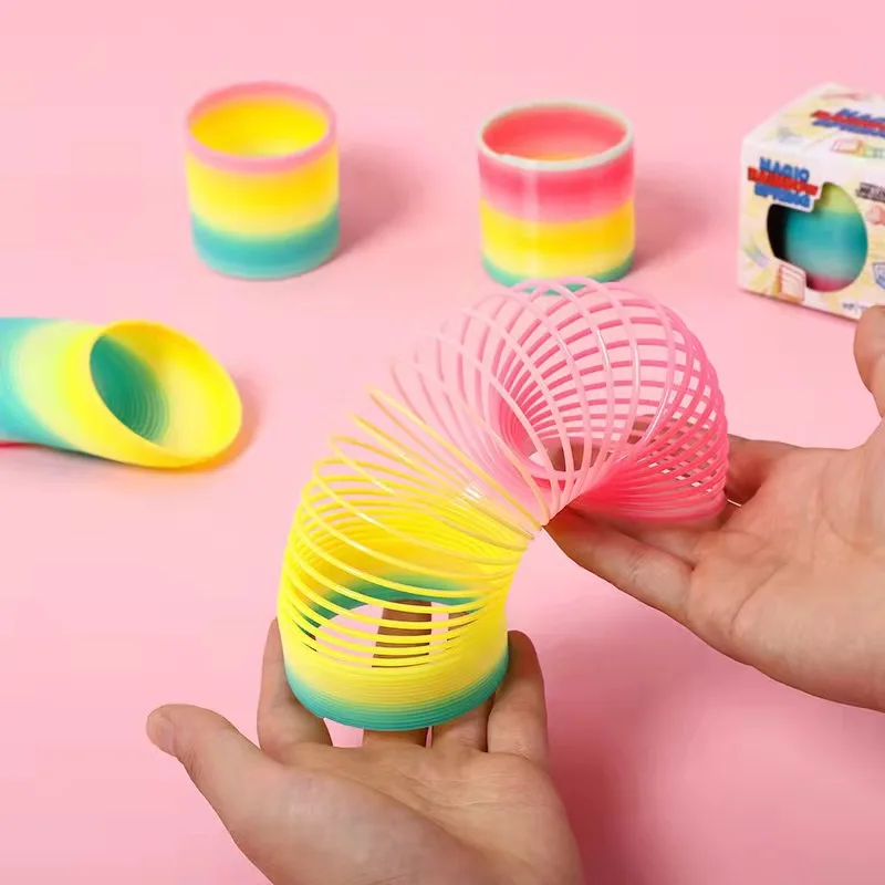 Wholesale  Multicolor Amazon hot selling Magic Educational Game Kids Plastic Spring Rainbow Ring Coil Toy