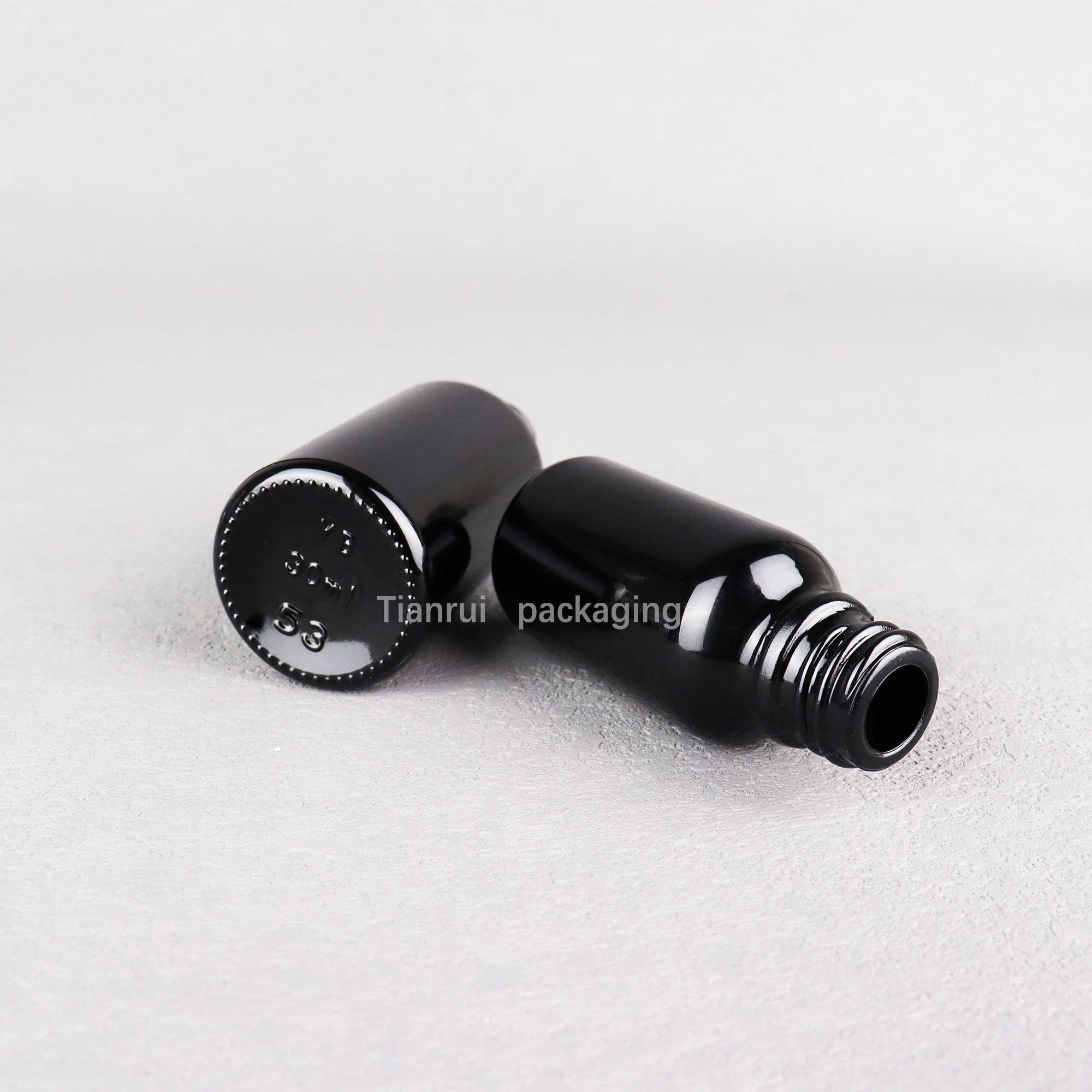 Custom 5ml 10ml 15 ml 20ml 30ml 50ml 100 ml UV Proof Black Essential Oil Glass Dropper Bottle with Sliver Lid in Bulk