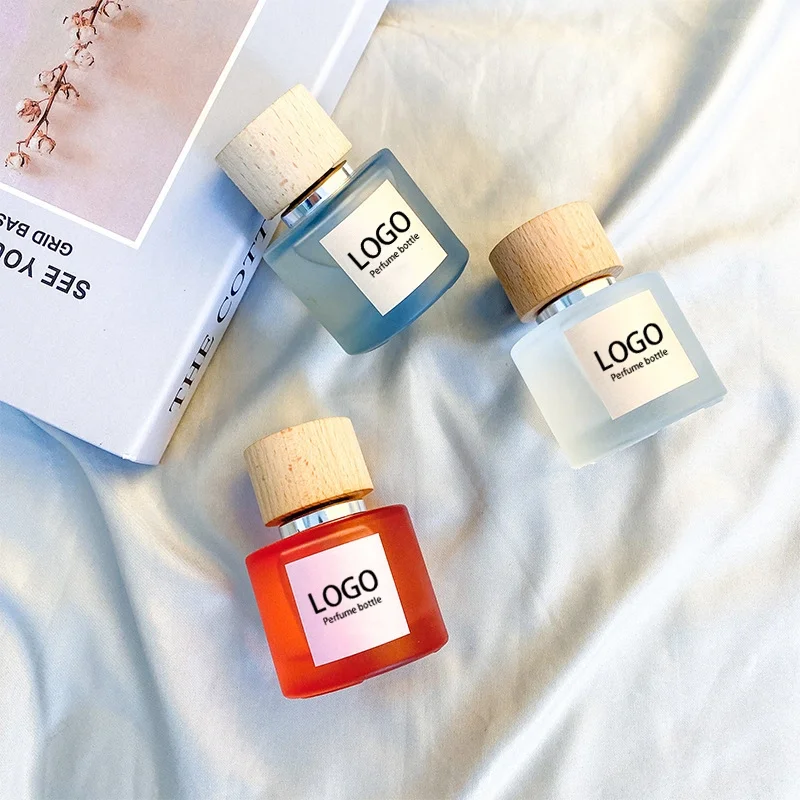 Design Luxury Custom LOGO Fragrance Pump Spray 50ml Round Sprayer Empty Oil Glass Perfume Bottles Packaging