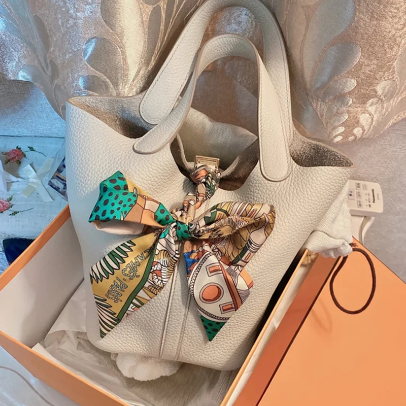 The first layer of cowhide basket handbags 2021 new fashion single product real cowhide European and American trendy bags