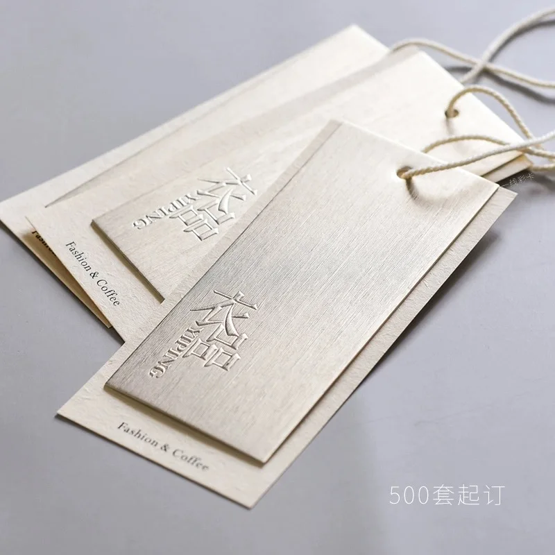 Luxury Custom Logo 500g Brushed Light Gold Special Paper Embossed Swing Tag Clothes Label Hang Tags