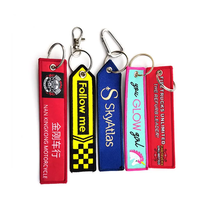 Hot sale Different Shape Remove Flight Before Flight Embroidered Logo Custom Jet Tag Keychains