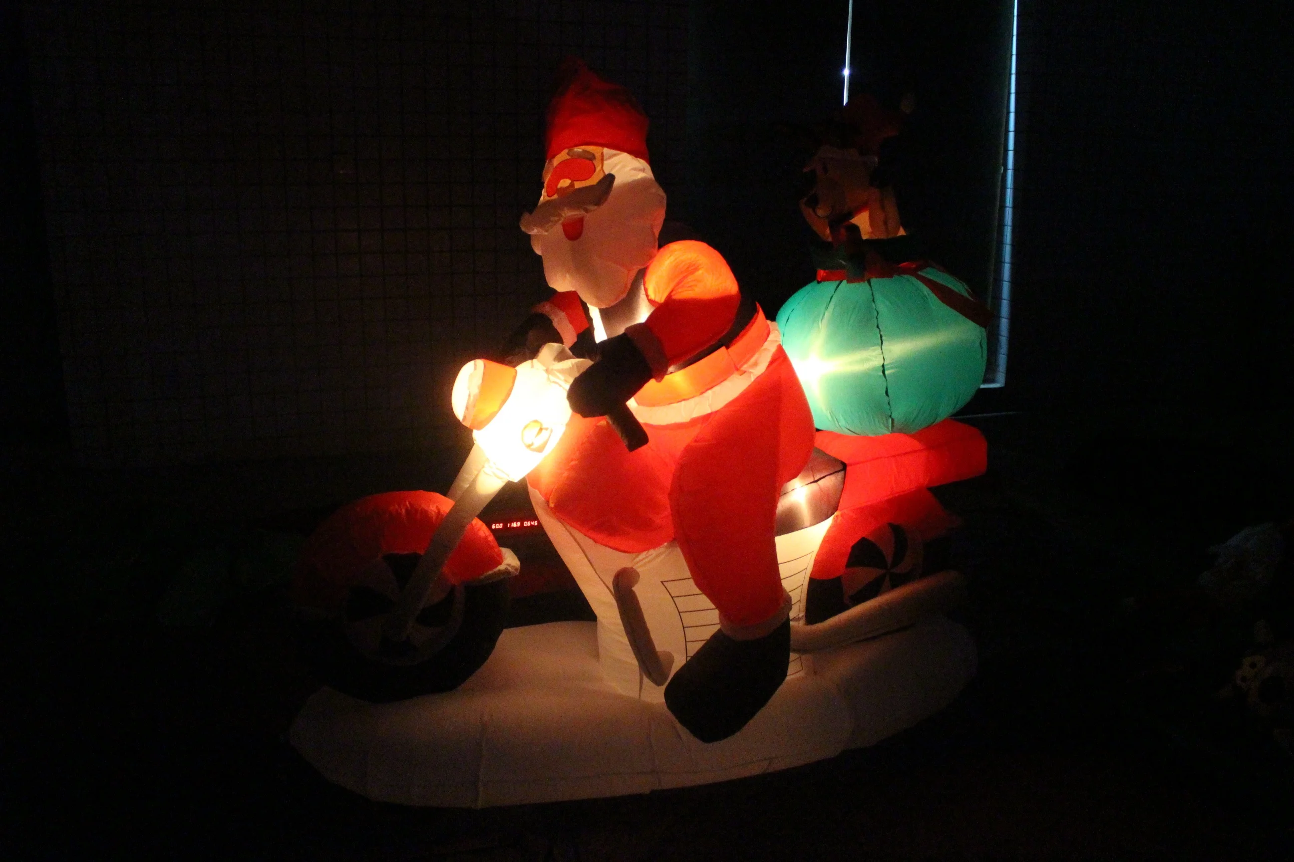 160cm inflatable santa claus riding a motorcycle with a reindeer and internal lights for christmas decoration