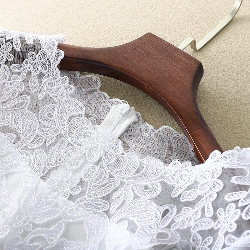 
Pure White Dress Summer Lace Bag Hip Mesh Female Short Sleeve Temperament Hepburn Style White Dress 