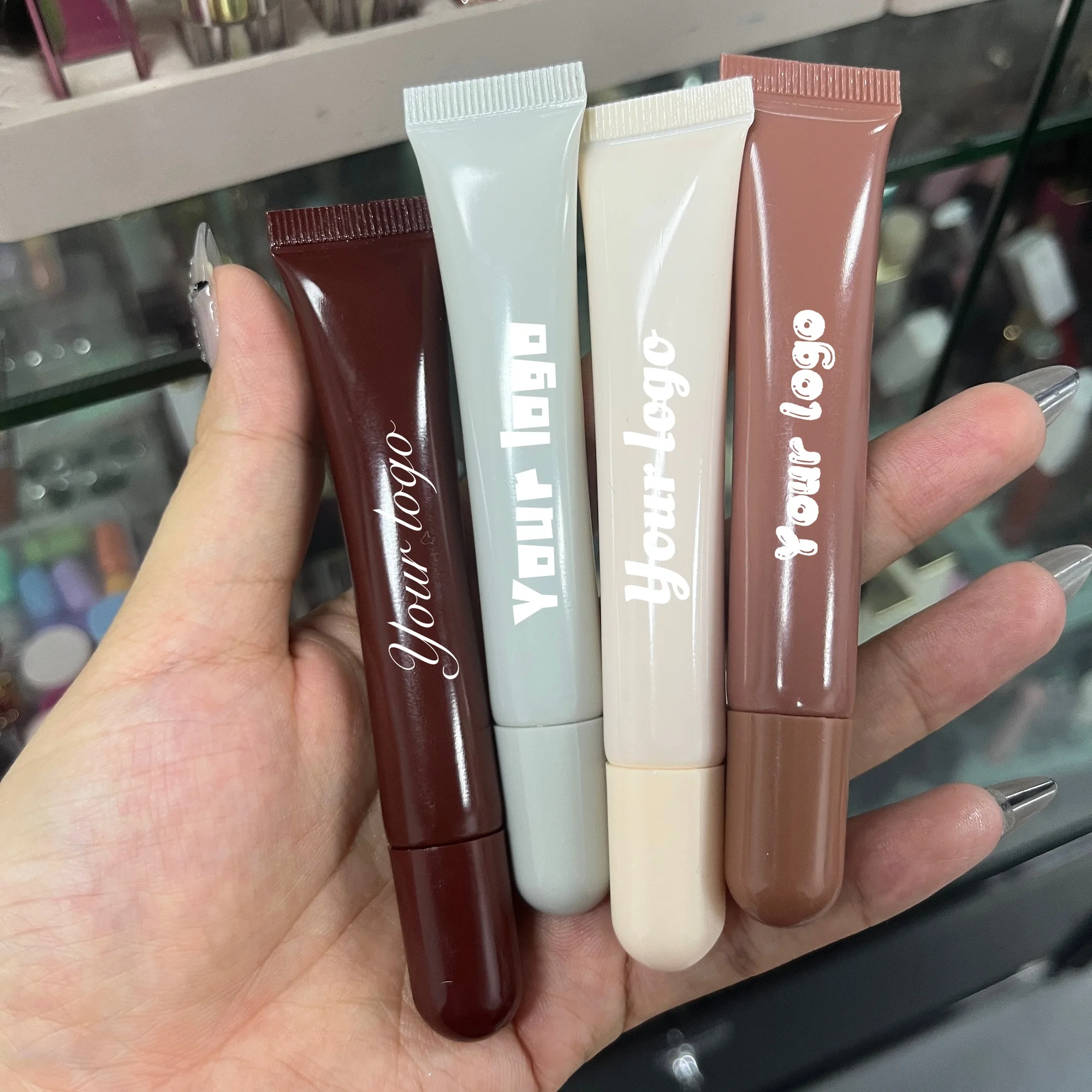 High Quality Lipstick Manufacturers Peptide Lip Balm Phone Case With Lip Gloss Private Label Plastic Bottle Lip Tint