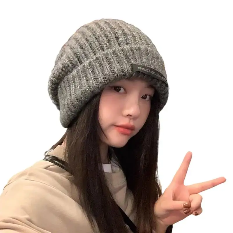 Hot Sale Stylish knitted hat earflap Bonnet Bun hat knitted Beanie winter hats for men women